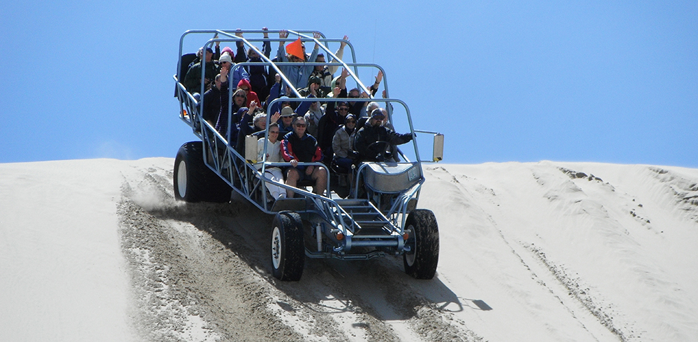 Multi-seat dune buggy on the sand dunes